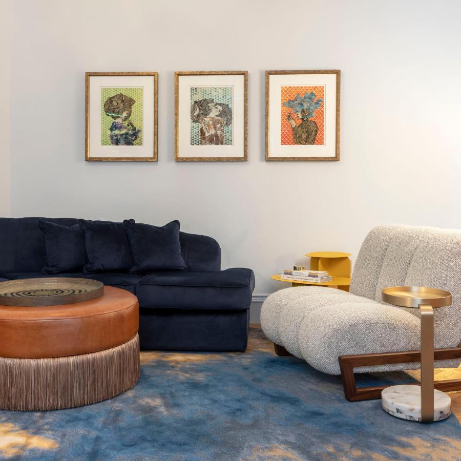 Virgin Hotels Εδιμβούργο Εξωτερικό φωτογραφία A living room with a sofa, armchair and ottoman